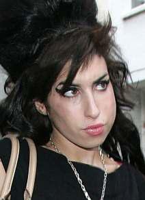 Friends secretly auctioned Winehouse items, court told