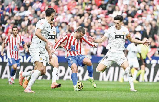Griezmann helps Atleti overcome Valencia, Girona down Sociedad