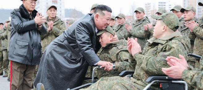 Kim praises troops returning from Russia