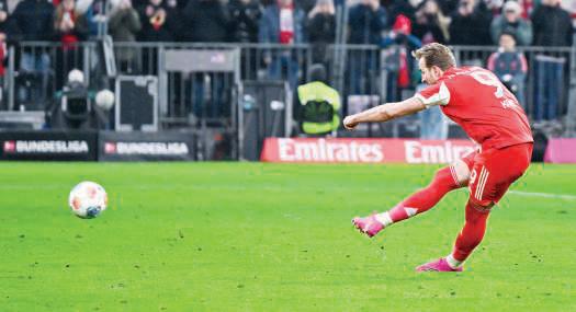 Kane penalty saves Bayern point against hapless Mainz