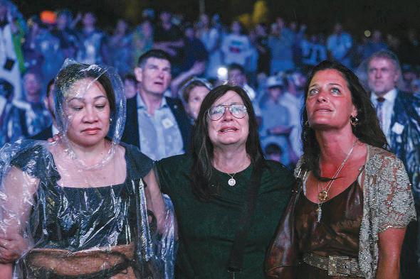 Australia falls silent for shooting victims