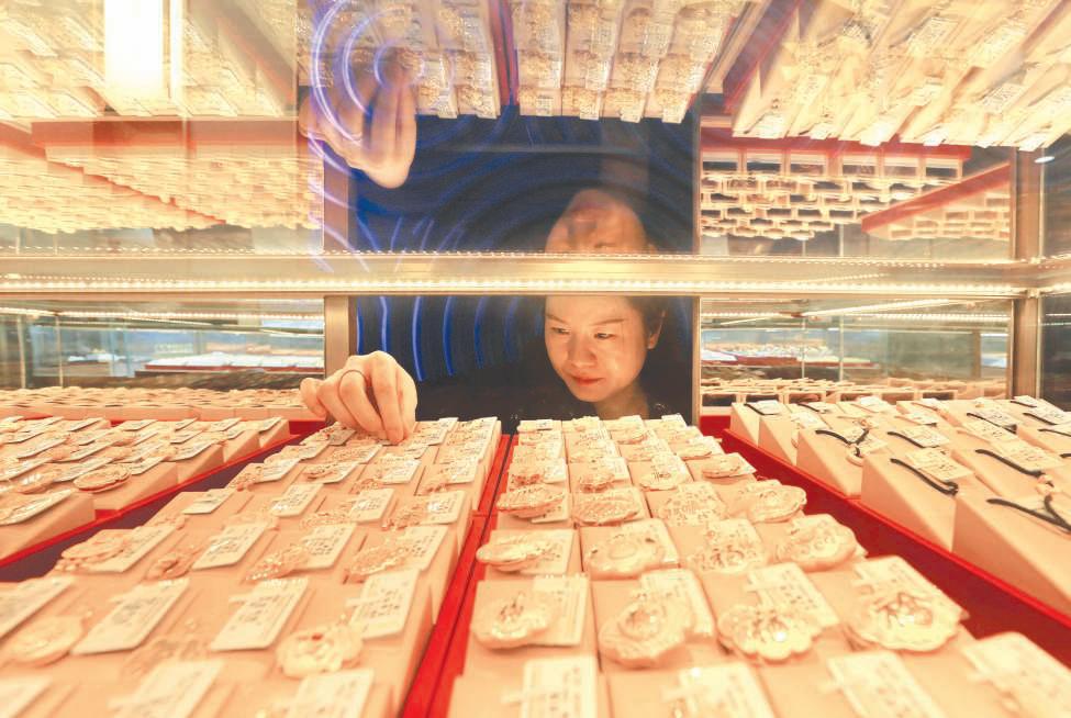 Gold and silver soar in year-end rally due to global woes, monetary policy