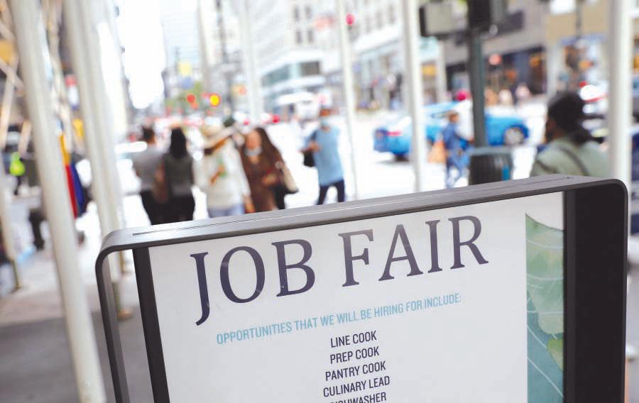 Fewer Americans are filing new applications for jobless benefits