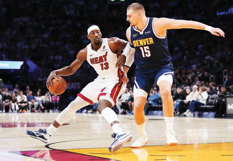 Nuggets lose Jokic, fall to Heat as Thunder rally to beak Hawks