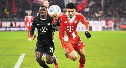 Olise sparkles as Bayern fire eight past hapless Wolfsburg
