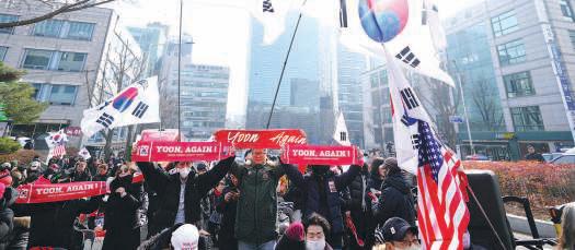 Yoon gets five years in jail over martial law