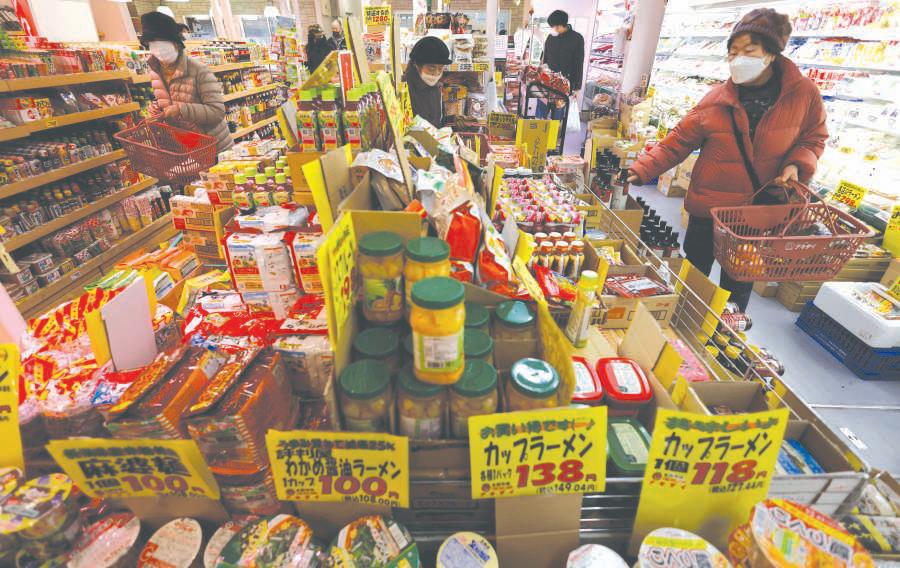 BoJ keeps rates steady, ups growth and inflation forecasts
