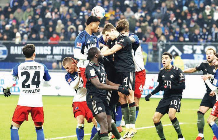 Bayern held at Hamburg to open door for Dortmund, Stuttgart win