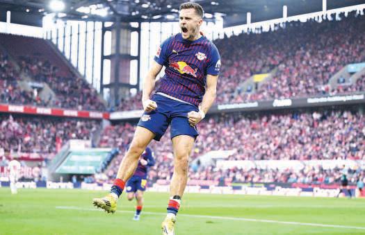Baumgartner brace helps Leipzig climb to fourth with Cologne romp
