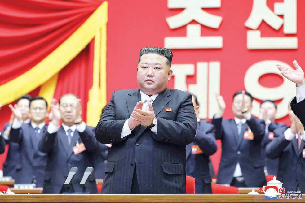Kim re-elected head of ruling party as N.Korea hails N-arms