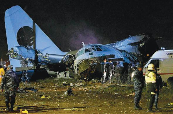 20 killed in cash-packed military plane crash