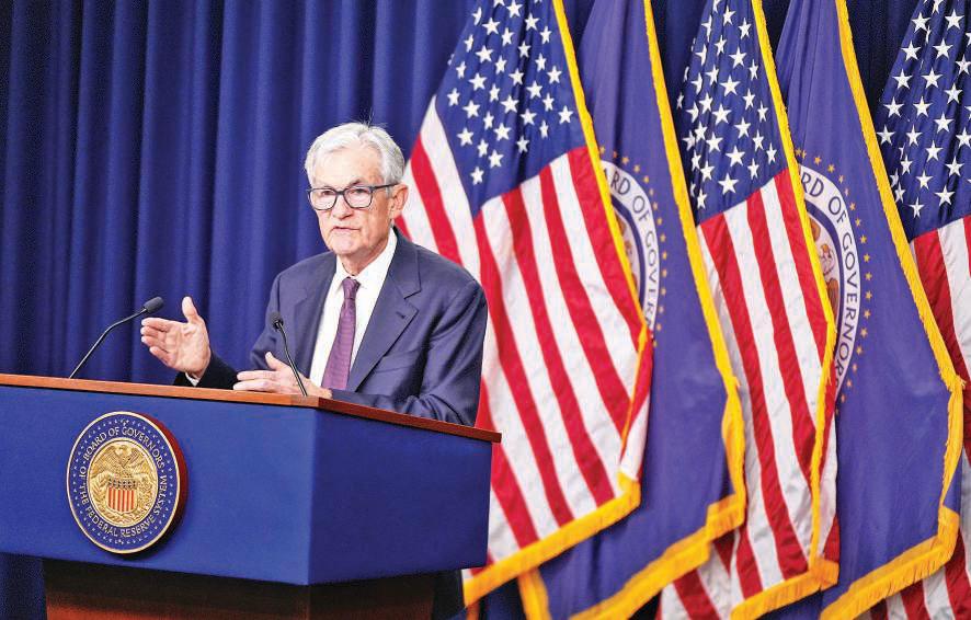 US Fed leaves key interest rates steady, expects inflation to rise