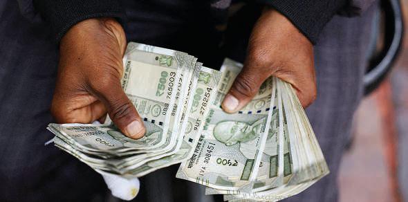 Indian rupee sinks to record low