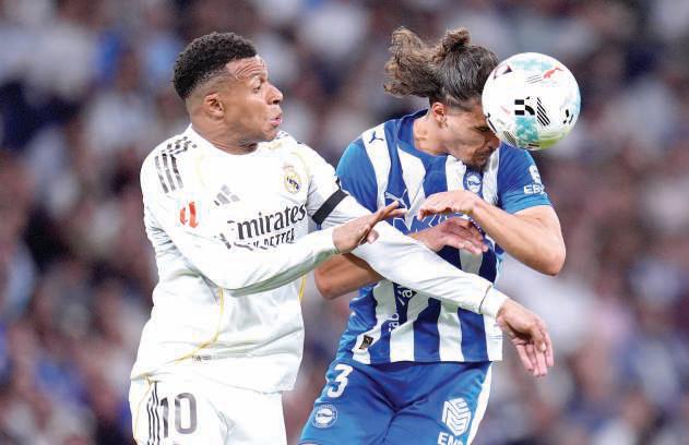 Mbappe and Vinicius lift Real out of 4-game slump with win over Alaves