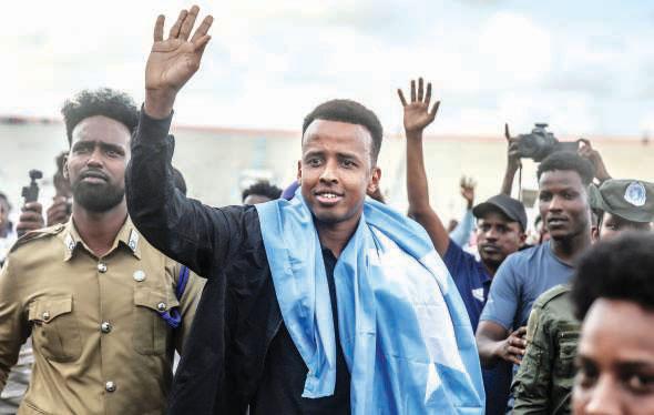 Somali referee comes home to hero's welcome after being denied US entry