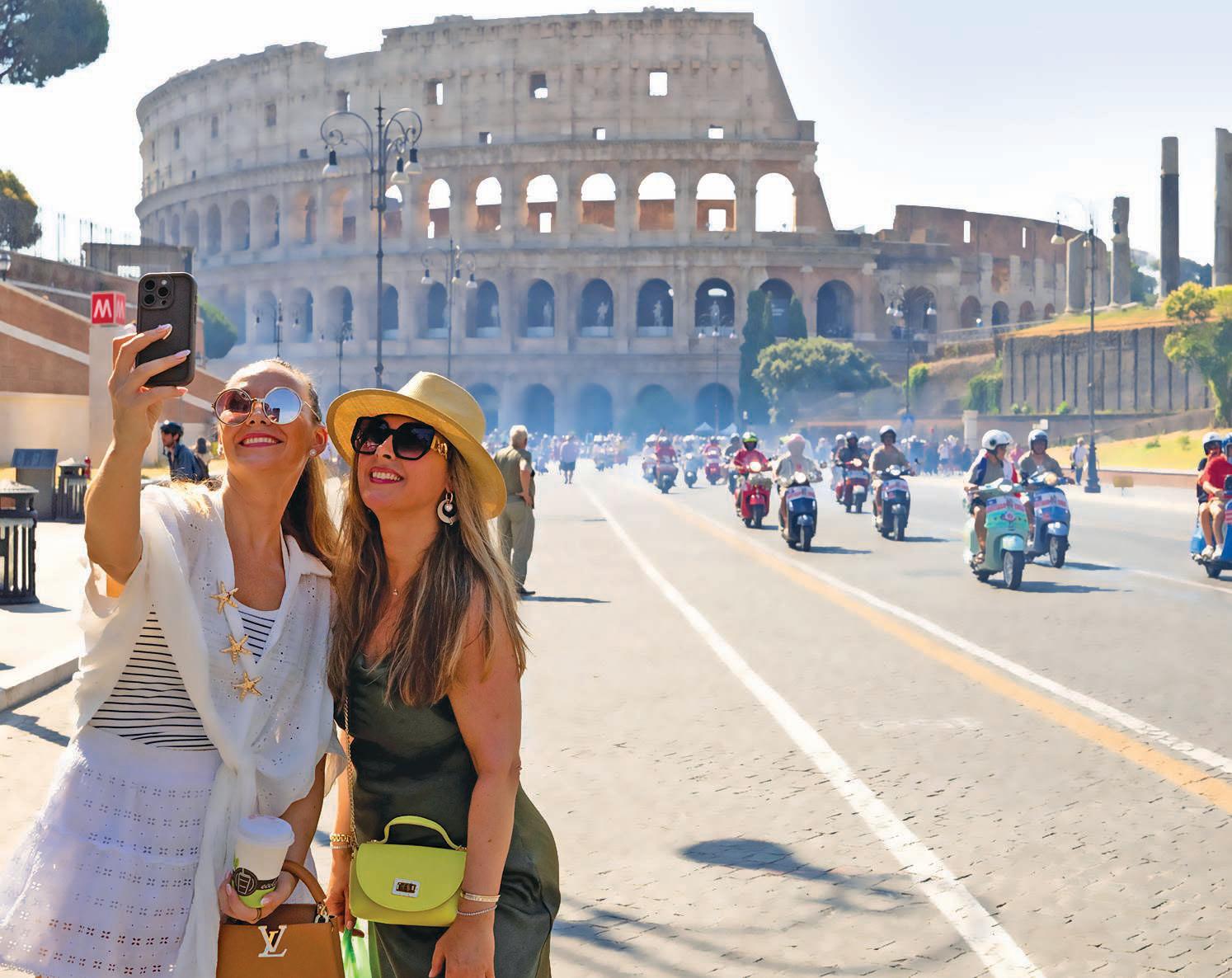 Thousands ride through Rome as Italy’s iconic scooter Vespa turns 80