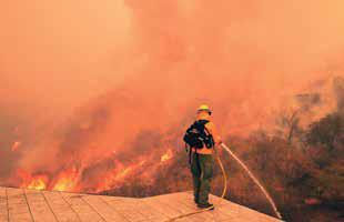 LA Wildfires Death Toll Rises as Crews Fight Heavy Winds to Save Landmarks