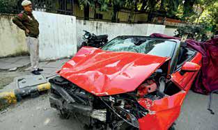 Speeding Audi rams scooter, two injured; driver detained