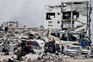 Israeli airstrikes across Gaza overnight kill at least 103 people