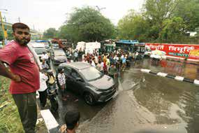 Pre-monsoon rains bring relief and chaos in Delhi