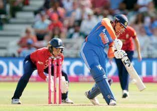 Ton-up Mandhana glitters as India make opening statement