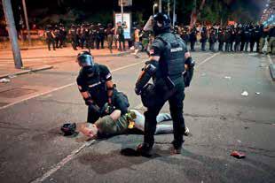 Dozens of protesters detained during clashes with riot police in Serbia