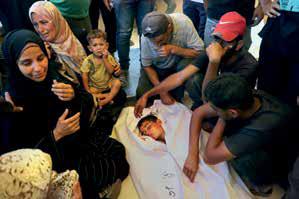 At Least 22 People Killed as Israeli Forces Fire on Crowds at Aid Sites