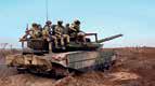 Israel strikes tanks in Syria as govt forces clash with militias