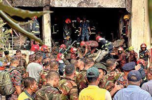 B'desh Air Force training aircraft crashes into school; 20 killed