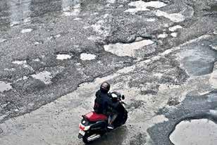 Pothole-ridden streets turn daily commute into ordeal for citizens