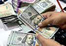 Rupee falls 13 paise to 87.69 against dollar