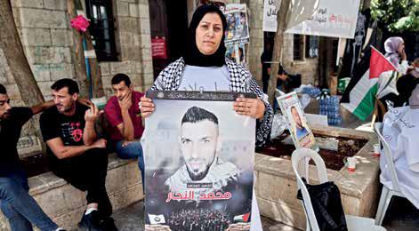 Protesters in Israel demand release of hostages as strikes kill 16 in Gaza