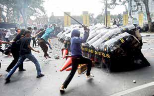 Tensions soar in Jakarta after police struck delivery rider caught in rally