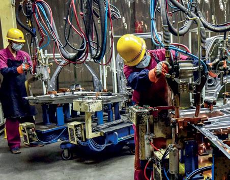 China's factory activity eases in Aug