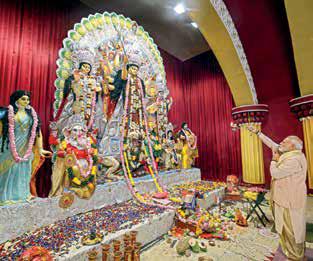 PM Modi visits Durga Puja pandal in Delhi's CR Park