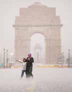Heavy rain brings Delhi to standstill, temperatures plunge