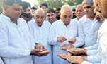 Hooda slams Haryana govt over paddy procurement