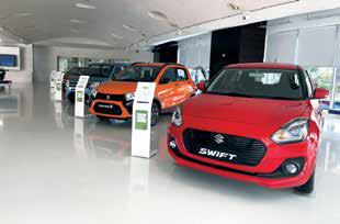 Carmakers post record sales in Oct on festive demand, GST cut