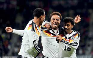 Germany and Netherlands reach the World Cup after big wins