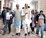 Min inspects dev works, orders faster completion