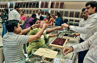 Gold, silver rally to extend record run as traders eye inflation data: Analysts