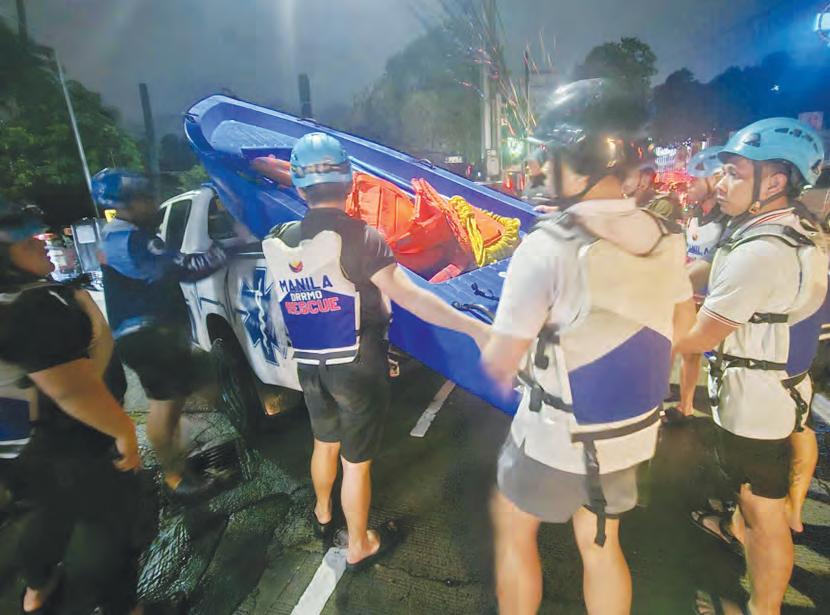 Over 800 families rescued in Manila amid widespread flooding