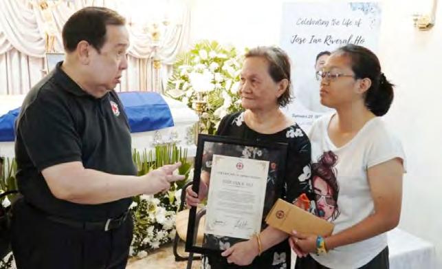Philippine Red Cross honors volunteer Jose Ian Ho, the Cebu earthquake hero who died saving his son