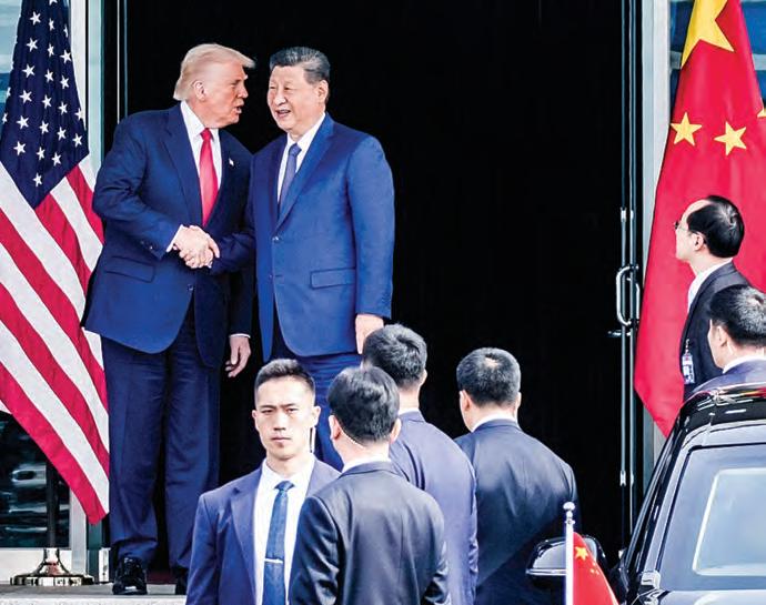 China's Xi promises to protect free trade at APEC as Trump snubs major summit