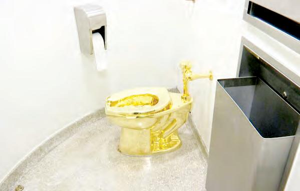Fully functional, solid gold toilet sells for $12.1M at auction
