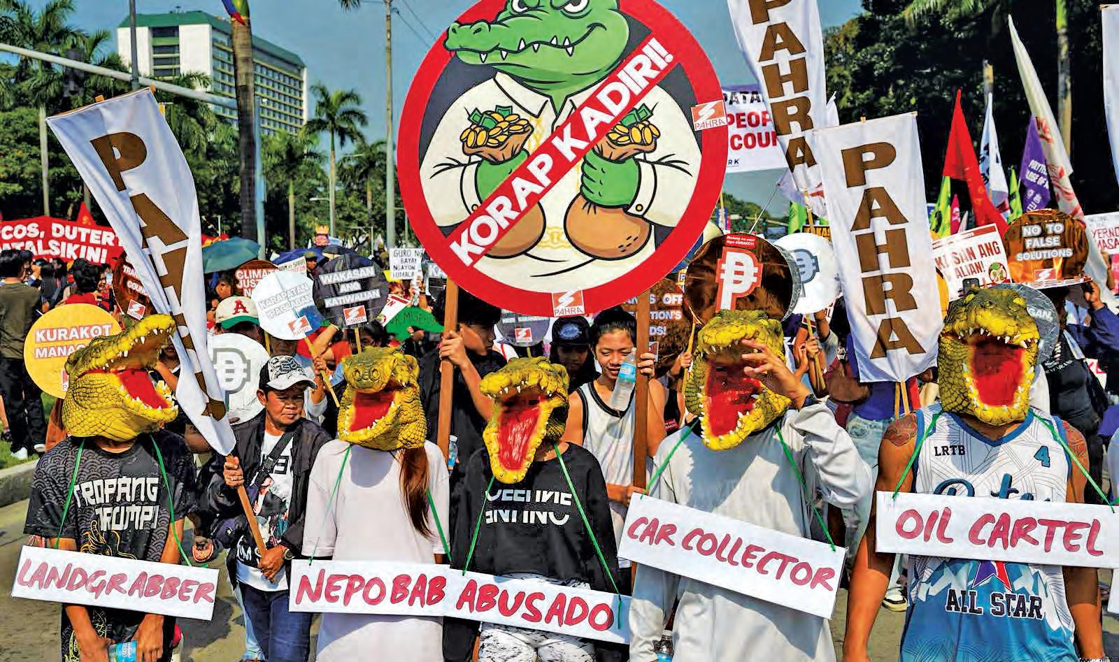 Thousands march vs corruption in Manila, QC