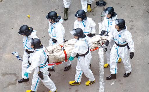 Death toll in Hong Kong apartment complex blaze rises to 146 as the city mourns