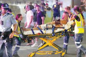 Father and son gunmen kill at least 15 people in attack on Hanukkah event at Sydney's Bondi Beach