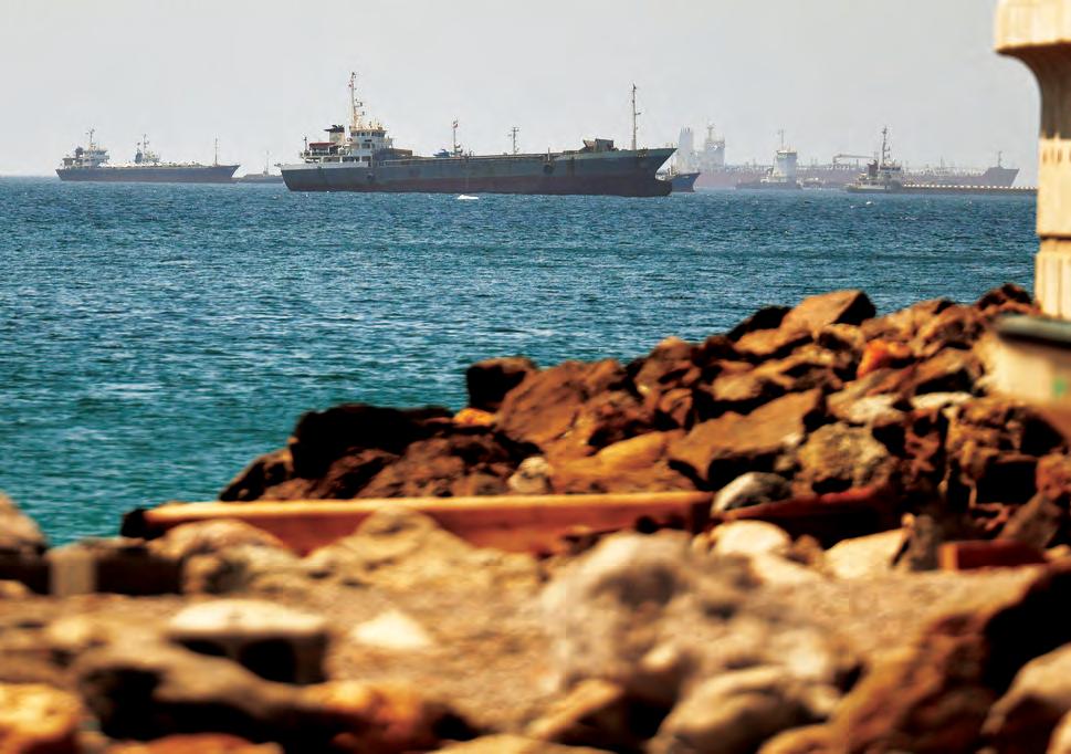 Stranded ships have begun transiting the Strait of Hormuz