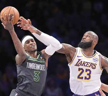 WOLVES MAUL LAKERS